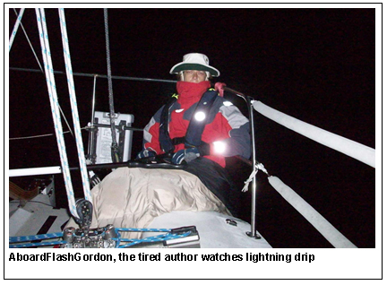 Aboard Flash Gordon, the tired author watches lightning drip